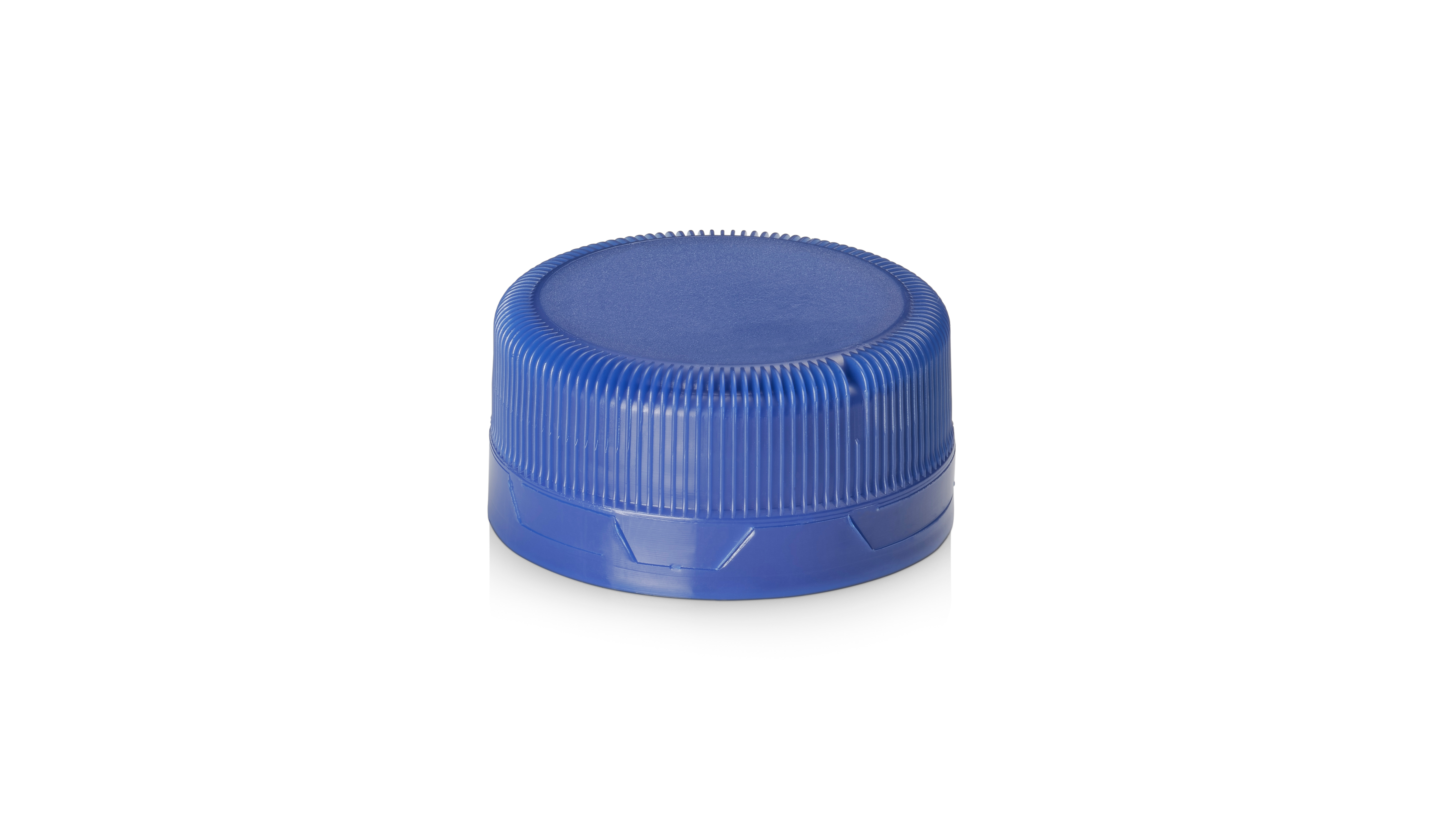 Blue plastic bottle cap on a white background.