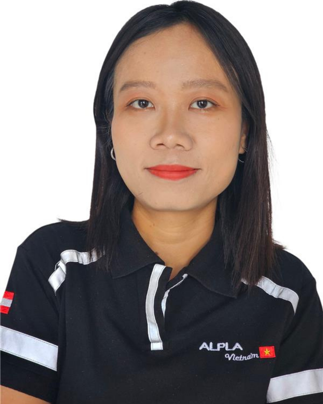 Business Development manager woman in an ALPLA Vietnam polo shirt against a white background.