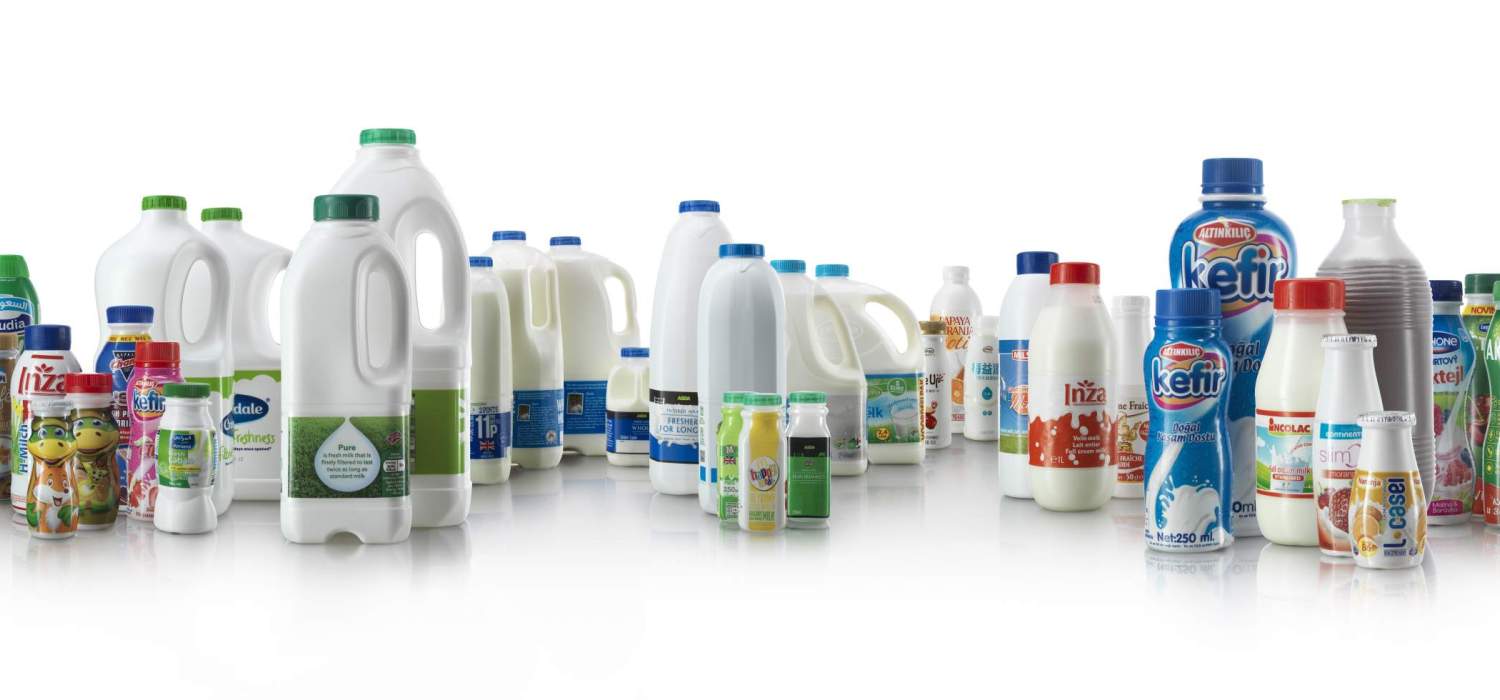 Various plastic bottles and containers in assorted shapes and sizes, some with colorful labels. Manufactured by ALPLA
