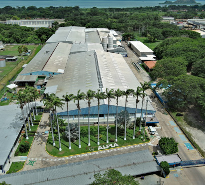 ALPLA facility surrounded by trees, aerial view.