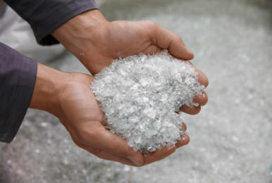 ALPLA rPET Flakes in hand