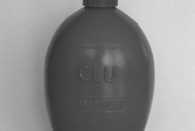 Plastic bottle with ribbed cap on a plain background.