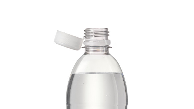 The white Tethered cap remains firmly attached to the bottle after opening. The cap is manufactured by ALPLA Group