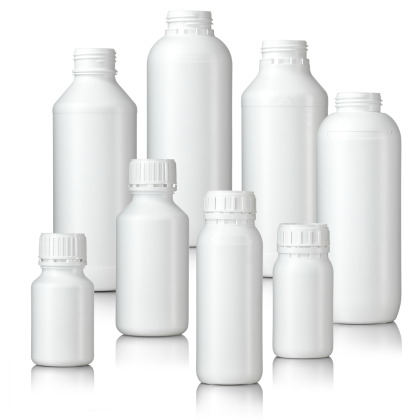 White plastic bottles of varying sizes arranged together.